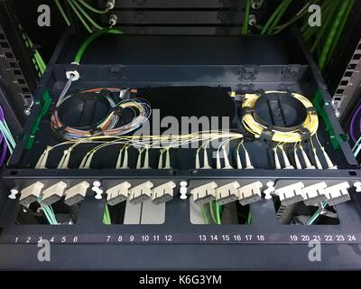 Fiber optic patch panel installation Stock Photo - Alamy