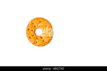 Round salty pretzel isolated on white background Stock Photo