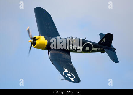 Vought F4U Corsair Second World War fighter plane flying at the Goodwood Revival 2017. Goodyear-built Vought FG-1D Corsair G-FGID Stock Photo