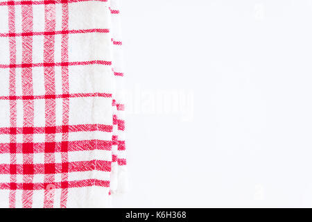 Red cloth, a kitchen towel with a checkered pattern, on a white background isolated. Stock Photo