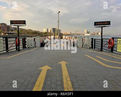 Fast ferry boat at the Bakirkoy port. Boats travelling between the European and Asian ports of Istanbul. Commercial name of boat company is IDO. Stock Photo