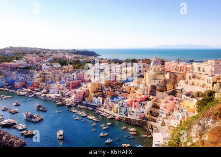 Panoramic view of the old village of fishermen's houses and the marina of Corricella, a classic panoramic view of the island of Procida, Italy.