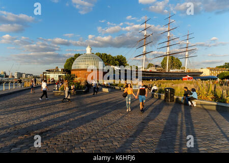 Greenwich Pier with Cutty Sark clipper ship and Greenwich Foot Tunnel entrance, London England United Kingdom UK Stock Photo