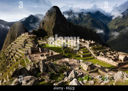 View of Machu Picchu during the wet season, Cusco Region, Urubamba Province, Peru, South America. Stock Photo