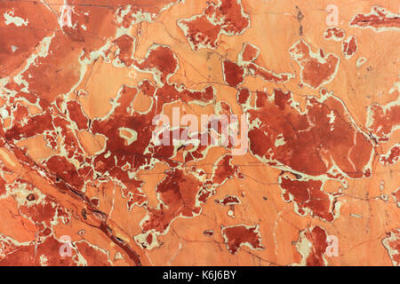 Red Marble Texture. Beautiful Marble Interior Background. Red Marbled Wall. Stock Photo