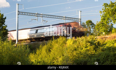 Reading, England, UK - August 29, 2016: A Crosscountry Voyager train at Goring in Berkshire, under new electrification equipment. Stock Photo