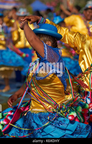 Pueblo dance group in ornate costume performing at the annual Carnaval Andino con la Fuerza del Sol in Arica, Chile. Stock Photo