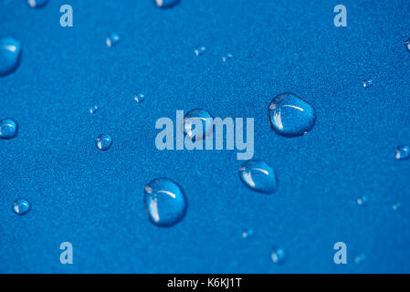 Close-up of water droplets on metal surface background Stock Photo