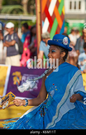 Pueblo dance group in ornate costume performing at the annual Carnaval Andino con la Fuerza del Sol in Arica, Chile. Stock Photo