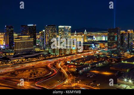 Las Vegas Luxor Sky Beam - Aerial evening view of the illuminated Las Vegas, Nevada skyline with the Luxor Sky Beam shinning bright into the twilight  Stock Photo