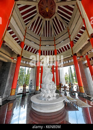 Chinese deity figure. Guanyin. Chinese pagoda. temple Interior, ornate ceiling, Romance of the Three Kingdoms. Culture centre. Pattaya Thailand. Asia Stock Photo