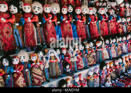 Dolls in Armenian national costumes. Flea market Vernissage Yerevan, Armenia Stock Photo