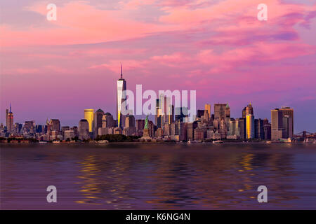 New York City NYC Landmarks - The New York City Skyline from midtown to lower Manhattan.   Among many seen is the illuminated Empire State Building (E Stock Photo
