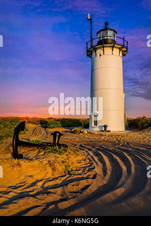 Race Point Light Provincetown MA - Race Point Lighthouse during the setting sun on Cape Cod in P-Town, Massachusetts. Available in color as well as in Stock Photo