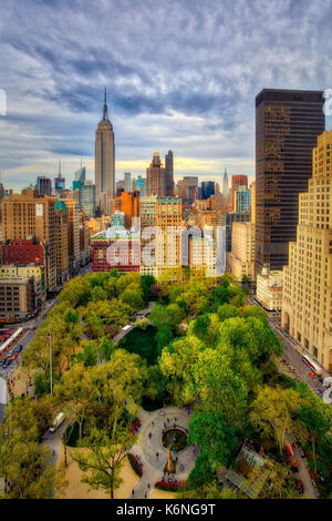 Aerial view to the Flatiron District along with Fifth Avenue,  Broadway , Madison Square Park as well as the the Empire State Building and the Chrysle Stock Photo