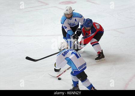 St. Petersburg, Russia - March 25, 2016: Ice hockey match Bobrov vs Piter during the tournament among children's teams League of the Future. Piter won Stock Photo