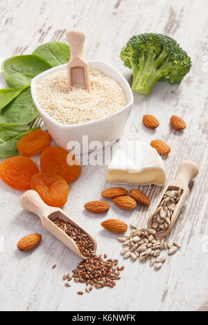 Ingredients or products containing calcium and dietary fiber with natural minerals, healthy lifestyle and nutrition concept Stock Photo