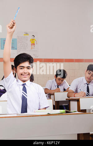 Happy Indian High School Students Studying Hand Raised In Classroom ...