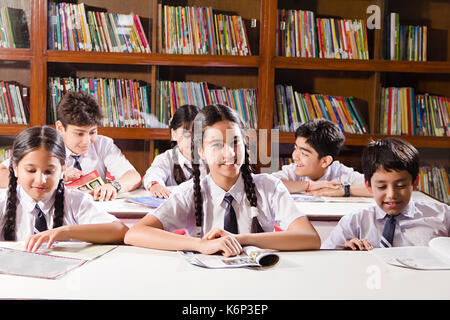 Group Indian School Students Books Studying In Library Stock Photo - Alamy