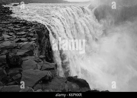 Dettifoss is a waterfall in Vatnajökull National Park in Northeast Iceland, and is reputed to be the most powerful waterfall in Europe. The water come Stock Photo