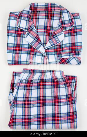 Checkered classic warm pajamas on white background closeup Stock Photo