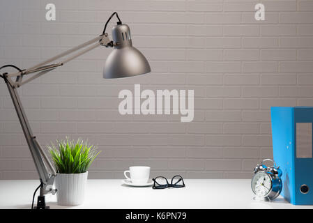 Empty white working table in fis at night Stock Photo