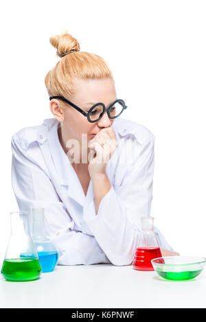 funny lab assistant in white lab coat sits at table in laboratory Stock ...