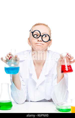 tired crazy chemist in glasses with test tubes conducting experiments in the laboratory Stock Photo