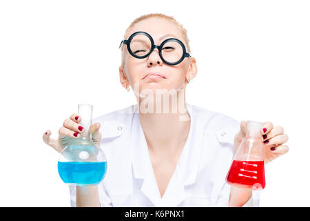 A crazy chemist in funny glasses with test tubes conducts experiments in the laboratory Stock Photo