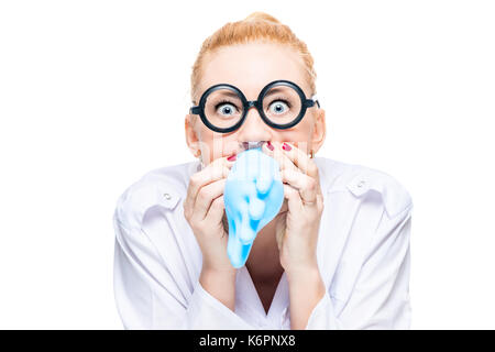Portrait of a mad doctor in round glasses with a blue glove Stock Photo