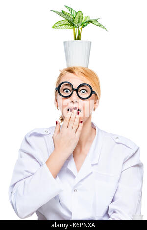Portrait of a funny doctor in round glasses with a flower pot on his head isolated Stock Photo