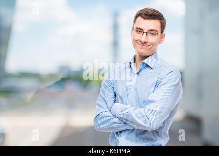 Smiling entrepreneur posing in office Stock Photo