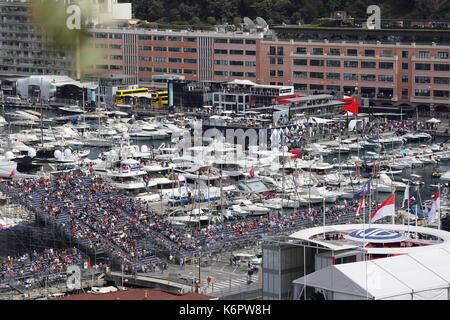 La Condamine, Monaco - May 28, 2016: Many Spectators in the Tribunes and People on Yachts For the Monaco Formula 1 Grand Prix 2016 Stock Photo