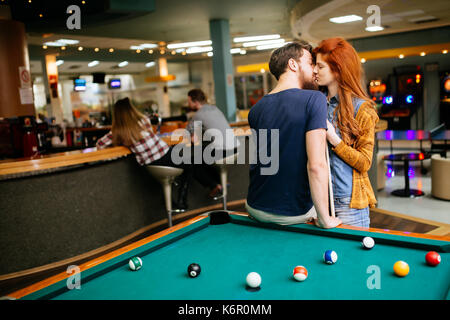Couple kissing on a date Stock Photo