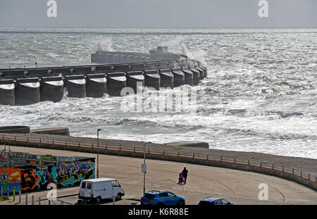 Brighton, UK. 13th Sep, 2017. UK Weather. Waves crash over Brighton Marina on a windy day on the south coast as Storm Aileen blows across Britain today Credit: Simon Dack/Alamy Live News Stock Photo