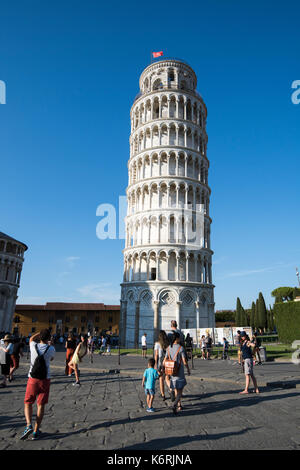 People taking photographs of themselves supporting the Leaning Tower of Pisa, Tuscany Italy Europe EU Stock Photo