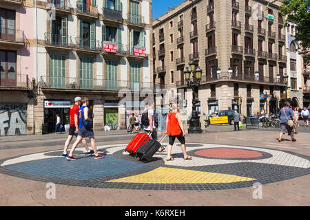 BARCELONA, SPAIN - SEPTEMBER 2: Joan Miro's Pla de l'Os mosaic in La Rambla on September 2, 2017 in Barcelona, Spain. Thousands of people walk daily o Stock Photo