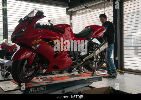 Kawasaki ZX1400 undergoing the finishing touches after fitting a 