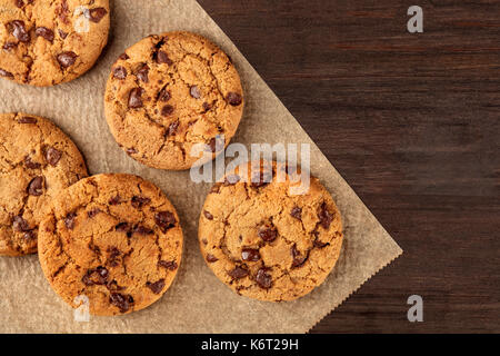 Chocolate chips cookies on baking paper with copyspace Chocolate chips cookies on baking paper with copyspace