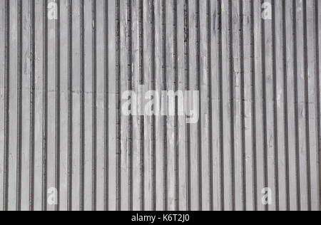 Urban background, white ruined industrial brick wall with copy space Stock Photo