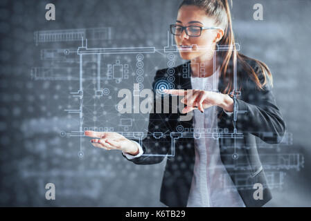 The person at the board of a financial dashboard of key indicators of stock market performance and business intelligence. Stock Photo