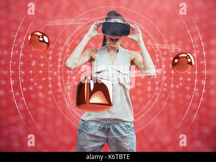 Visual reality concept. Young man using Visual reality or VR headset and interacting with object Stock Photo