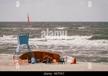 Sarbinowo, Poland -  August 2017 : Lifeguard station on the beach before the storm Stock Photo