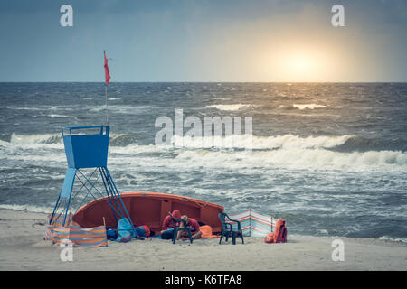 Sarbinowo, Poland -  August 2017 : Lifeguard station on the beach before the storm Stock Photo