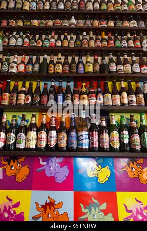 Romania, Crisana Region, Oradea, Lactobar, retro-bistro restaurant, interior beer bottle display Stock Photo