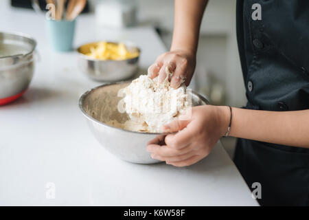 Bakery chef cooking bake in the kitchen professional Stock Photo