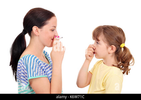 Smoking can cause asthma and diseases in children Stock Photo
