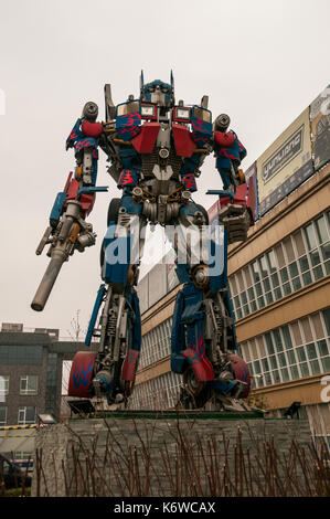 An Optimus Prime like Transformer made from car parts on the Beijing Tuning Street Stock Photo