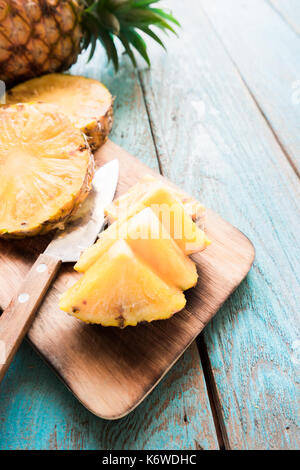 pineapple on the wood texture background Stock Photo