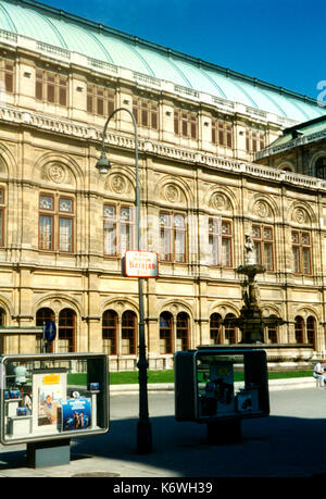 People watching open air live Opera outside the State Opera House in  Karajan Platz Vienna in Austria Stock Photo - Alamy